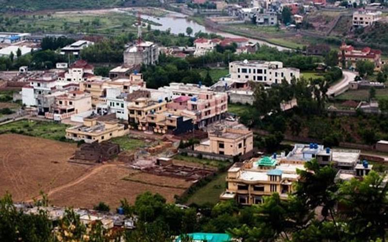 القادر ٹرسٹ کیس: اشتہاری ملزم کی بنی گالہ میں 405 کنال اراضی نیلام